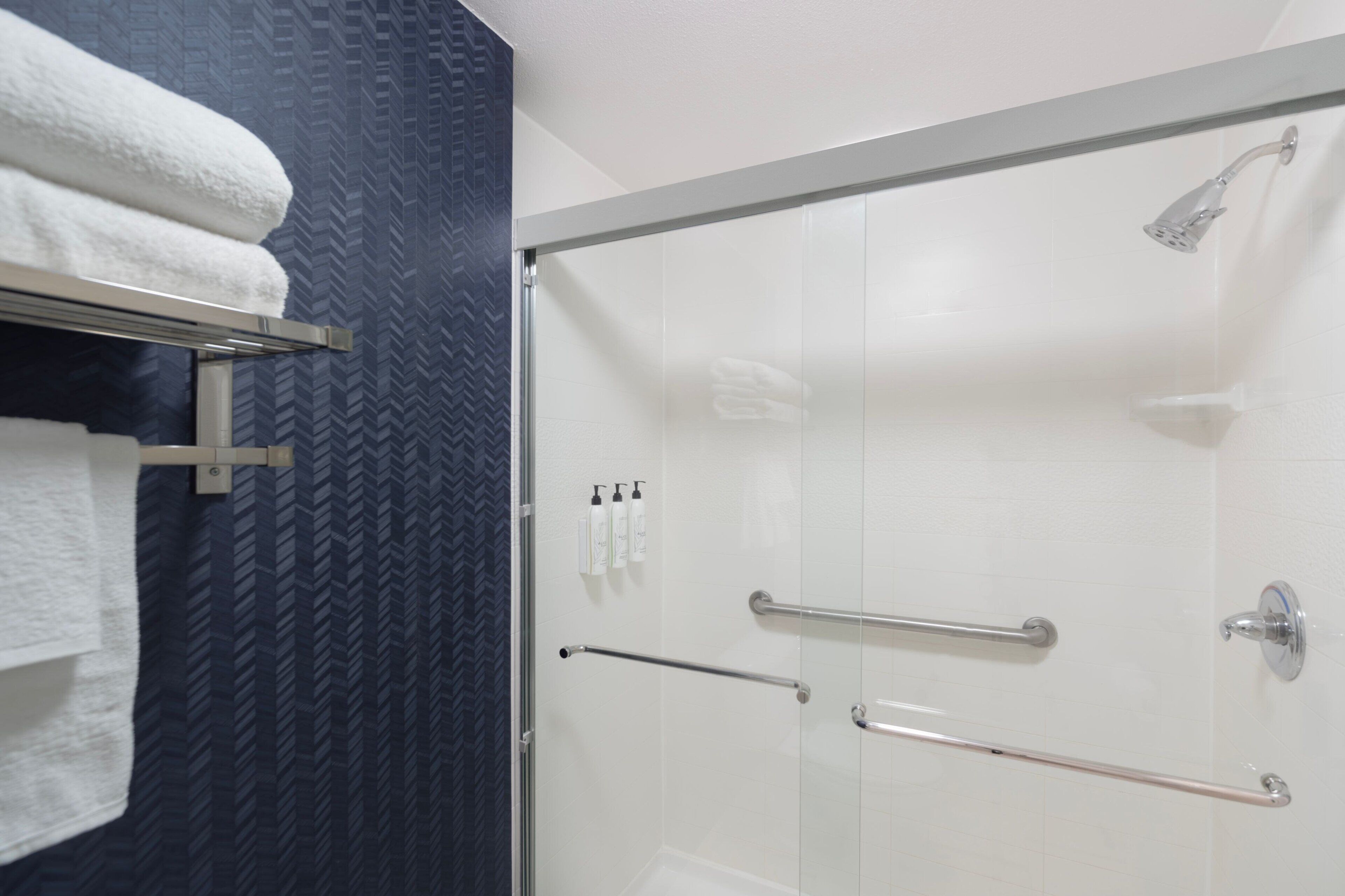 shower, free toiletries, hair dryer, towels