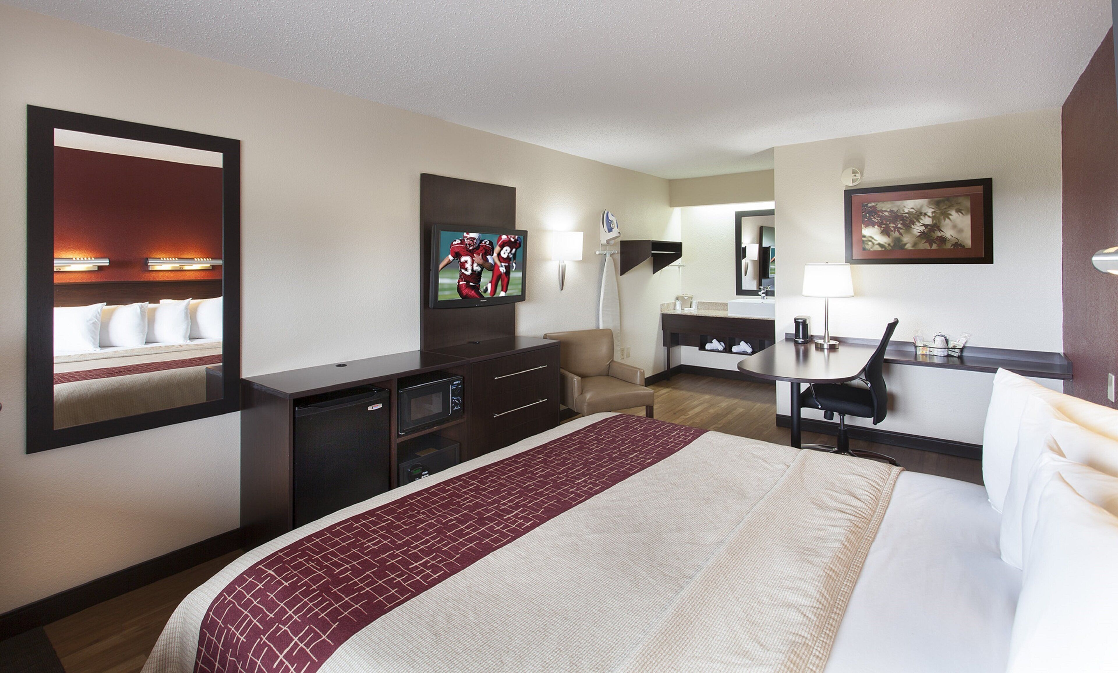 superior room, 1 king bed (smoke free) | premium bedding, in-room safe, desk, laptop workspace