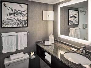 Combined shower/tub, designer toiletries, hair dryer, towels