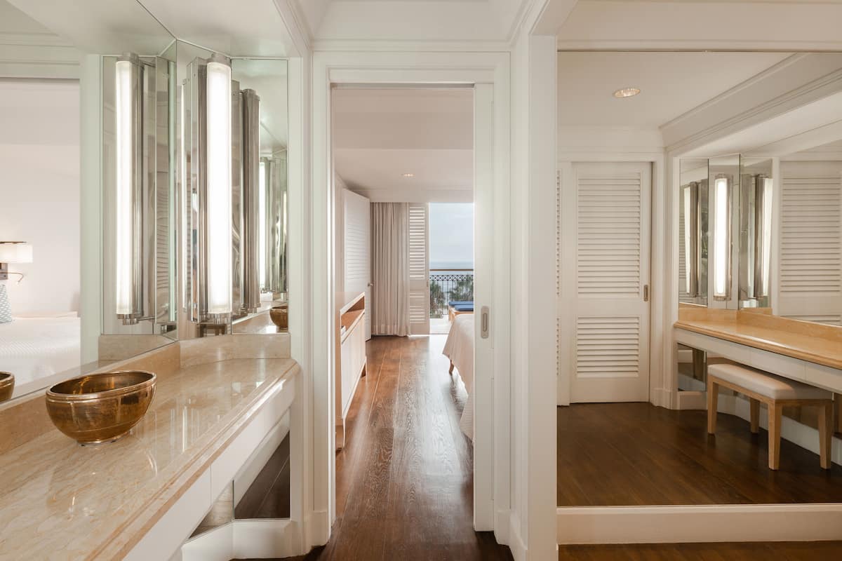 two bedroom sea view deluxe suite | bathroom | designer toiletries, hair dryer, bathrobes, slippers