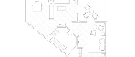 Grundriss eines Hotelzimmers mit Küchenzeile, Essbereich und Bad.