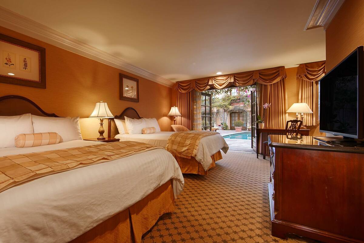 standard room, 2 queen beds, non smoking, refrigerator & microwave | premium bedding, in-room safe, desk, blackout curtains