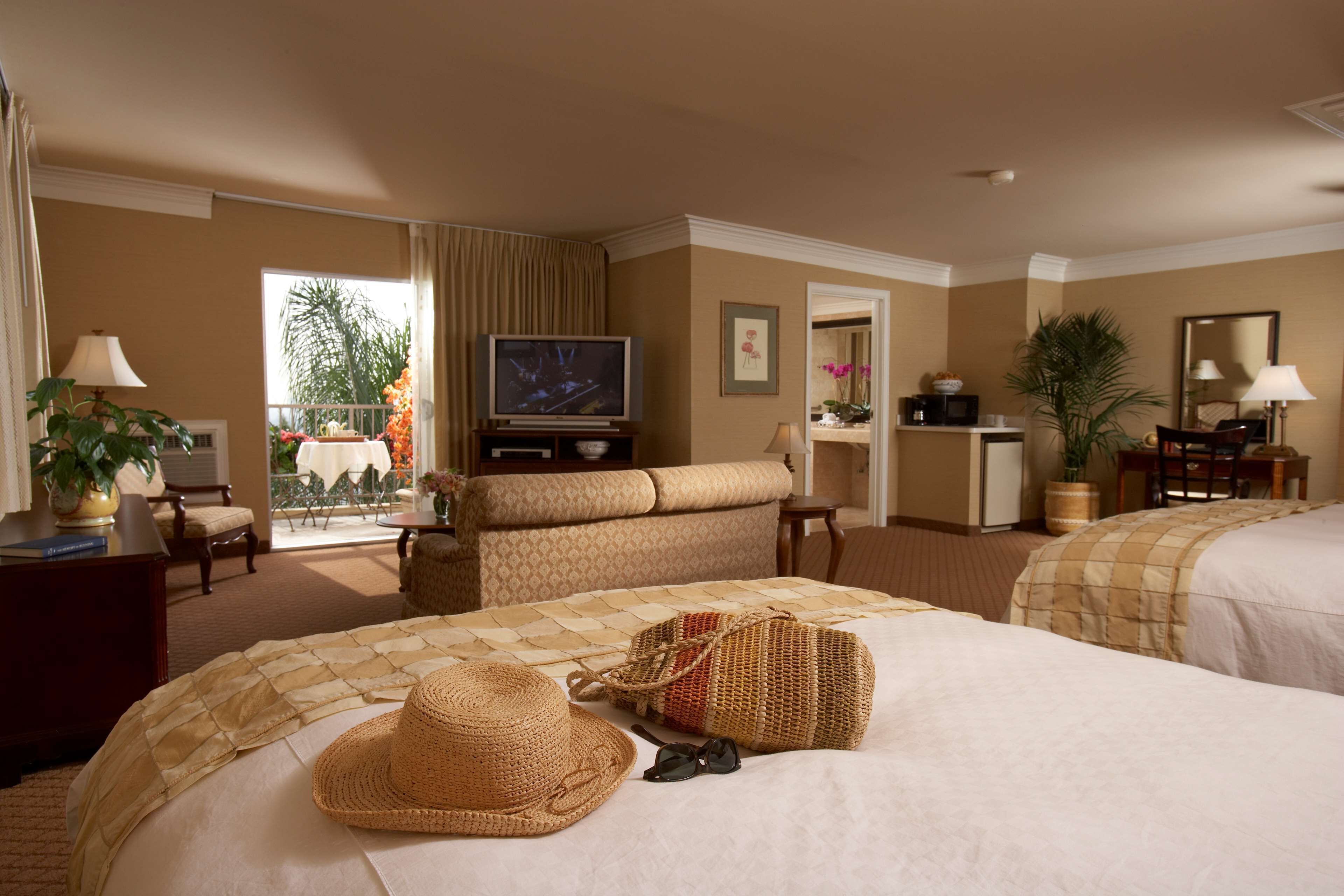 suite, 2 queen beds, balcony, city view (with sofabed) | premium bedding, in-room safe, desk, blackout curtains