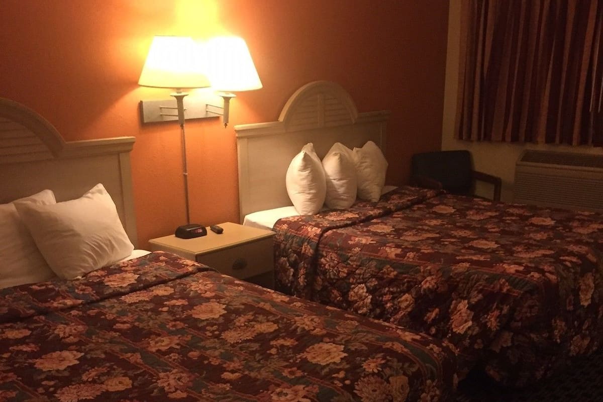 Desk, WiFi (free), alarm clocks, bed sheets
