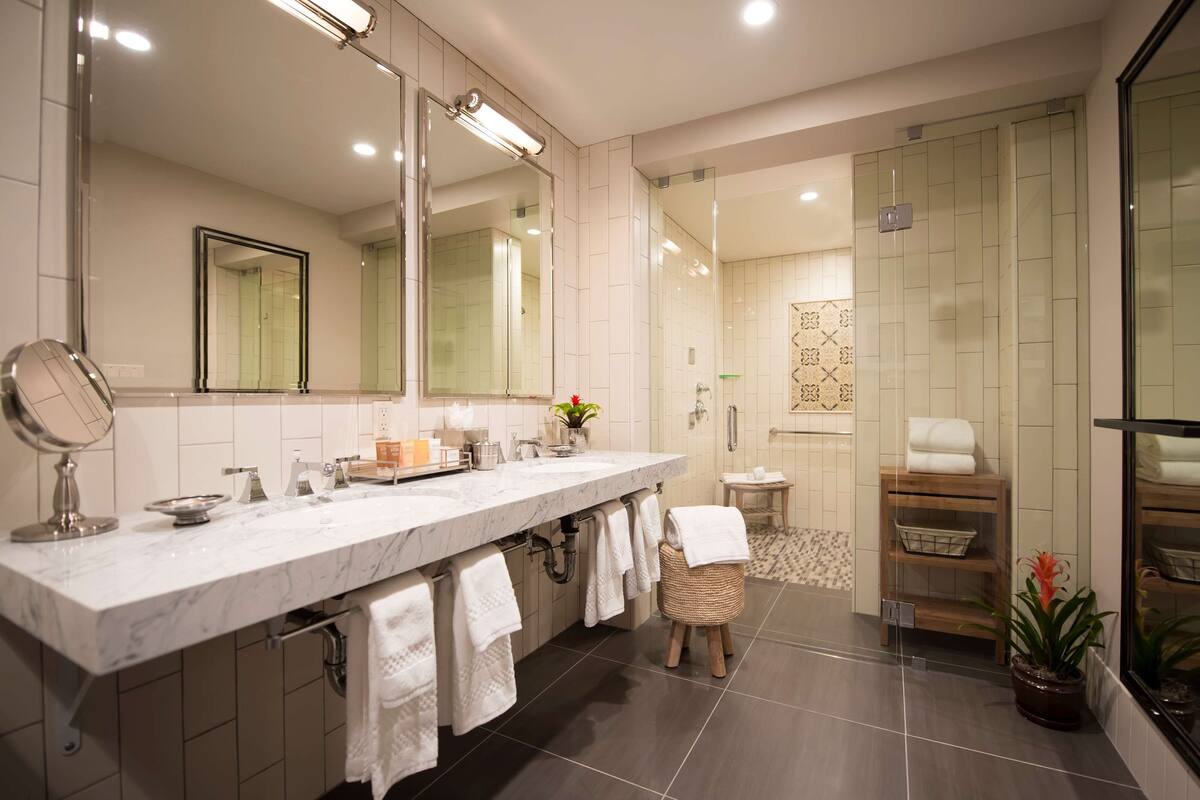 shower, designer toiletries, hair dryer, bathrobes