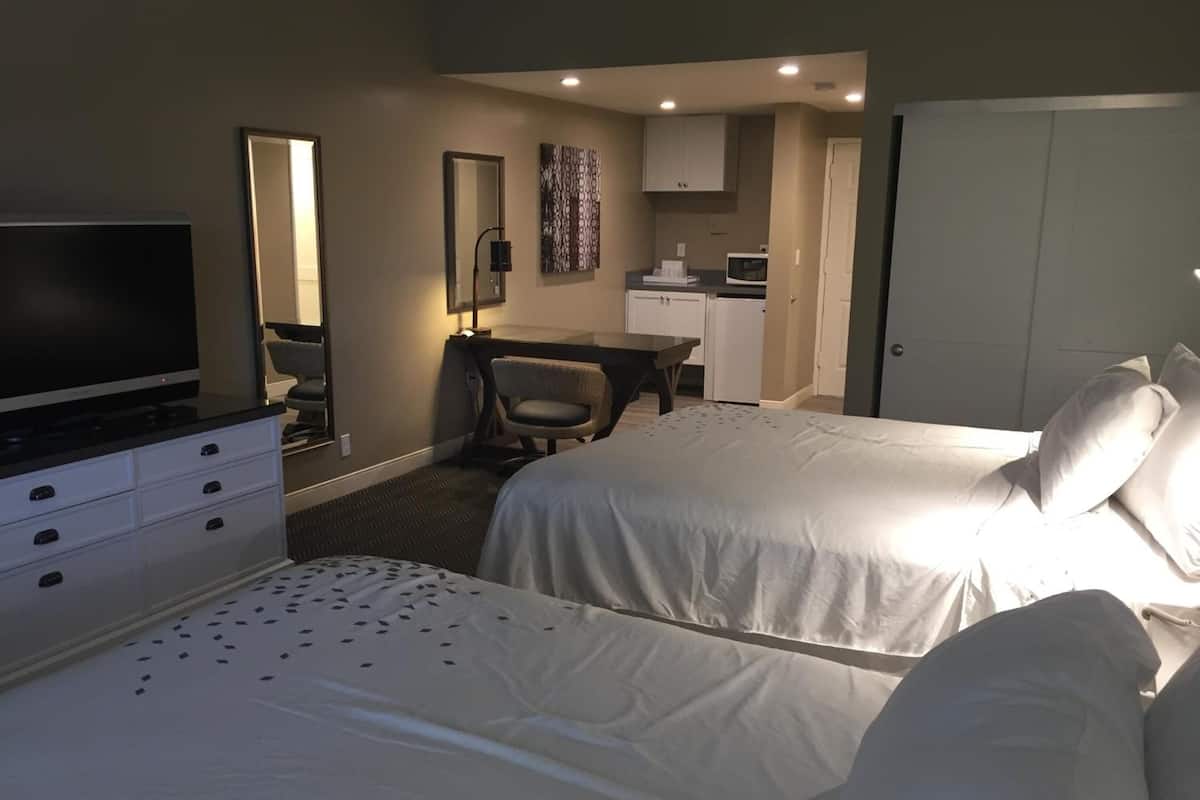Suite, 2 Queen Beds, Kitchen | In-room safe, desk, blackout drapes, iron/ironing board