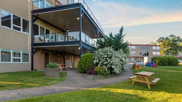 Enjoy the view from the upper-floor balcony with large windows and a flat facade.