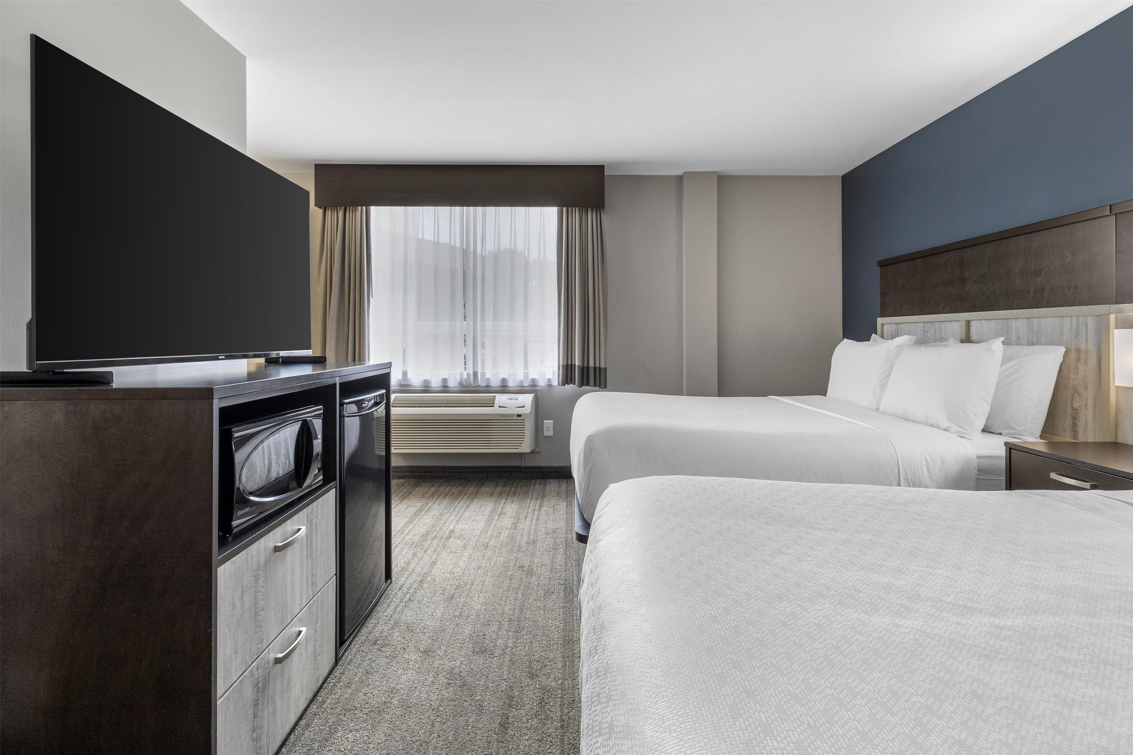 Premium bedding, pillow-top beds, in-room safe, blackout curtains