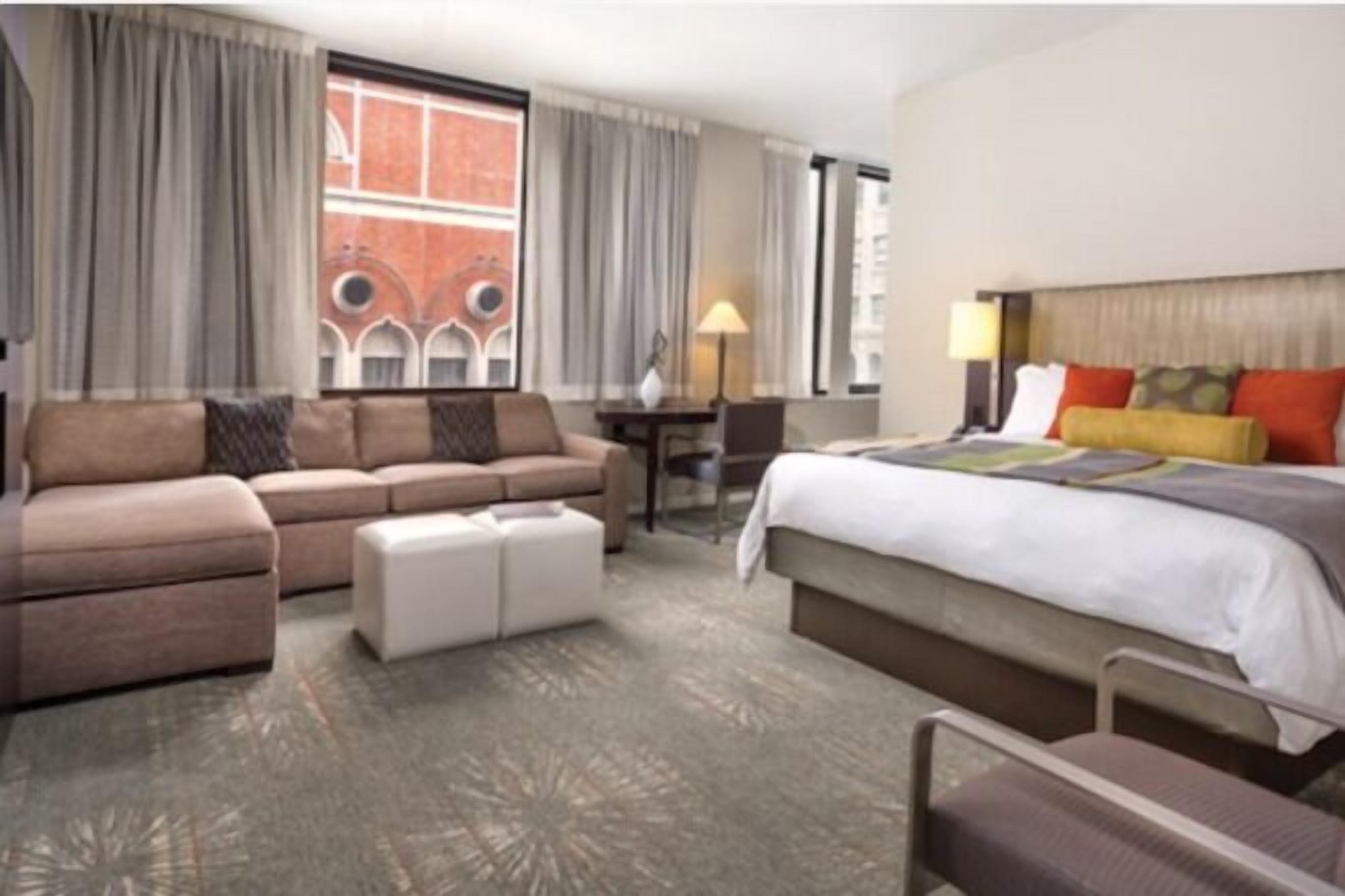 Premium bedding, down duvets, in-room safe, desk