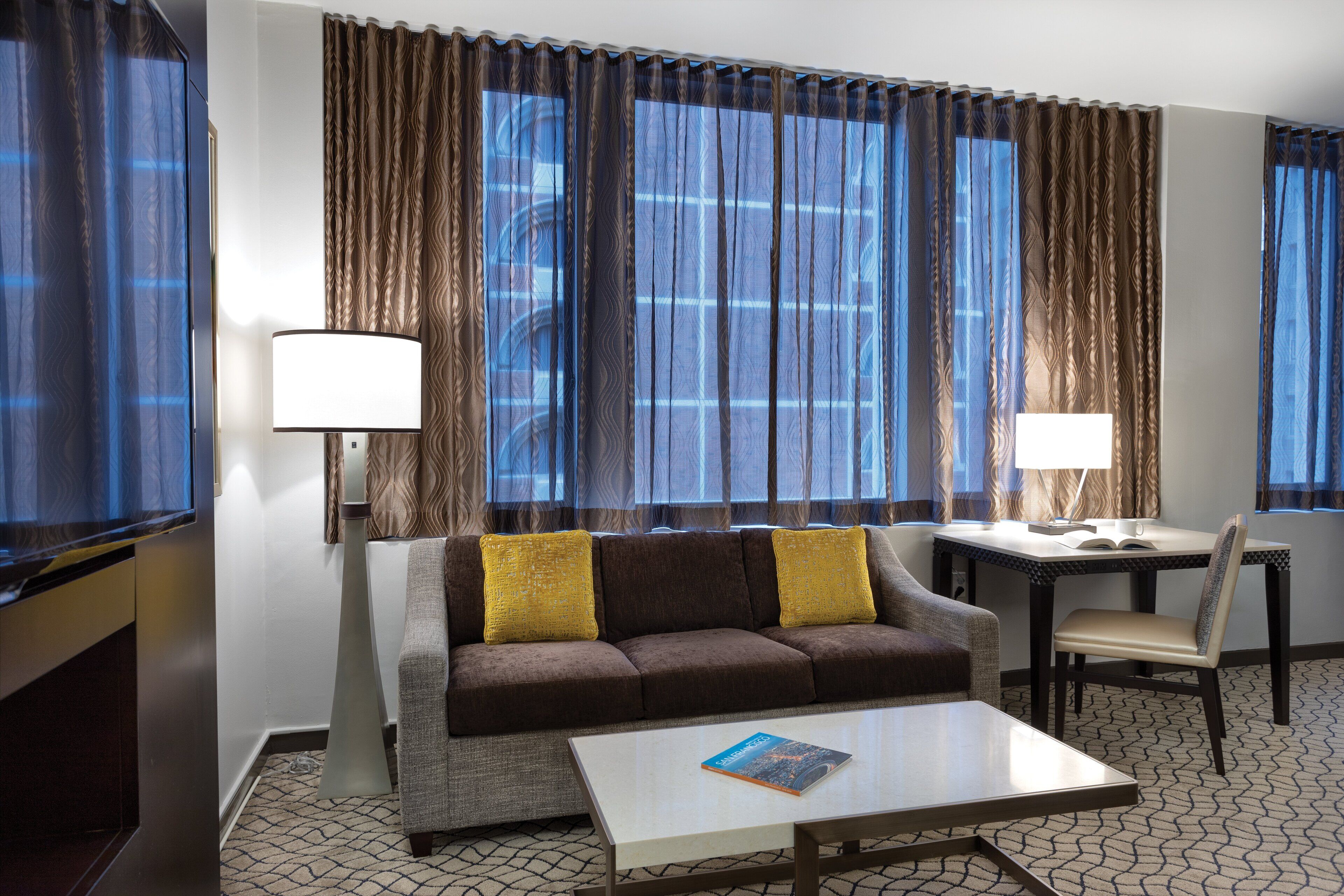 studio suite, 1 king bed with sofa bed, kitchenette | living room | 32-inch lcd tv with cable channels, tv