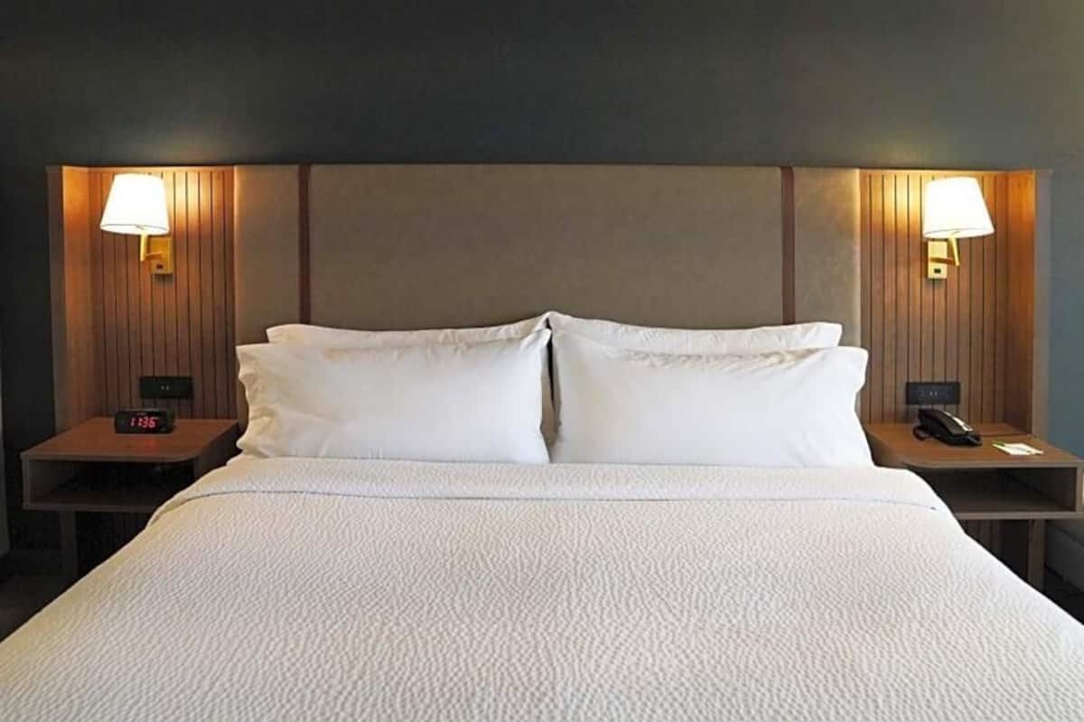 Premium bedding, down comforters, desk, laptop workspace