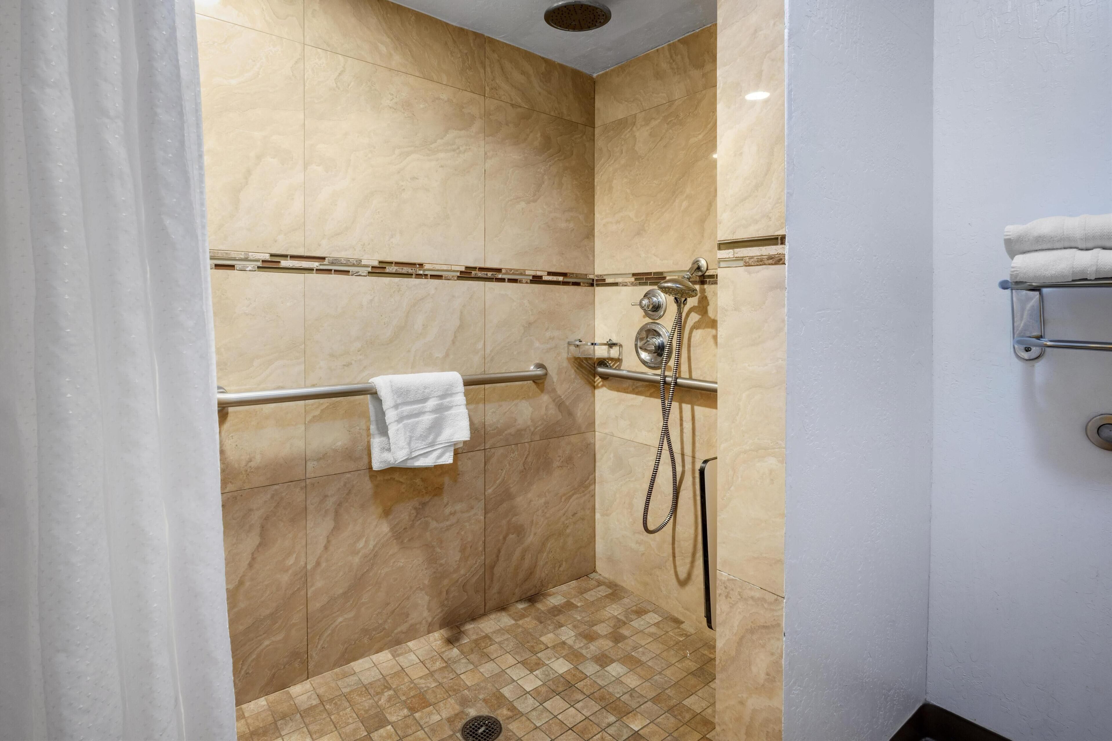 combined shower/bathtub, free toiletries, hair dryer, towels