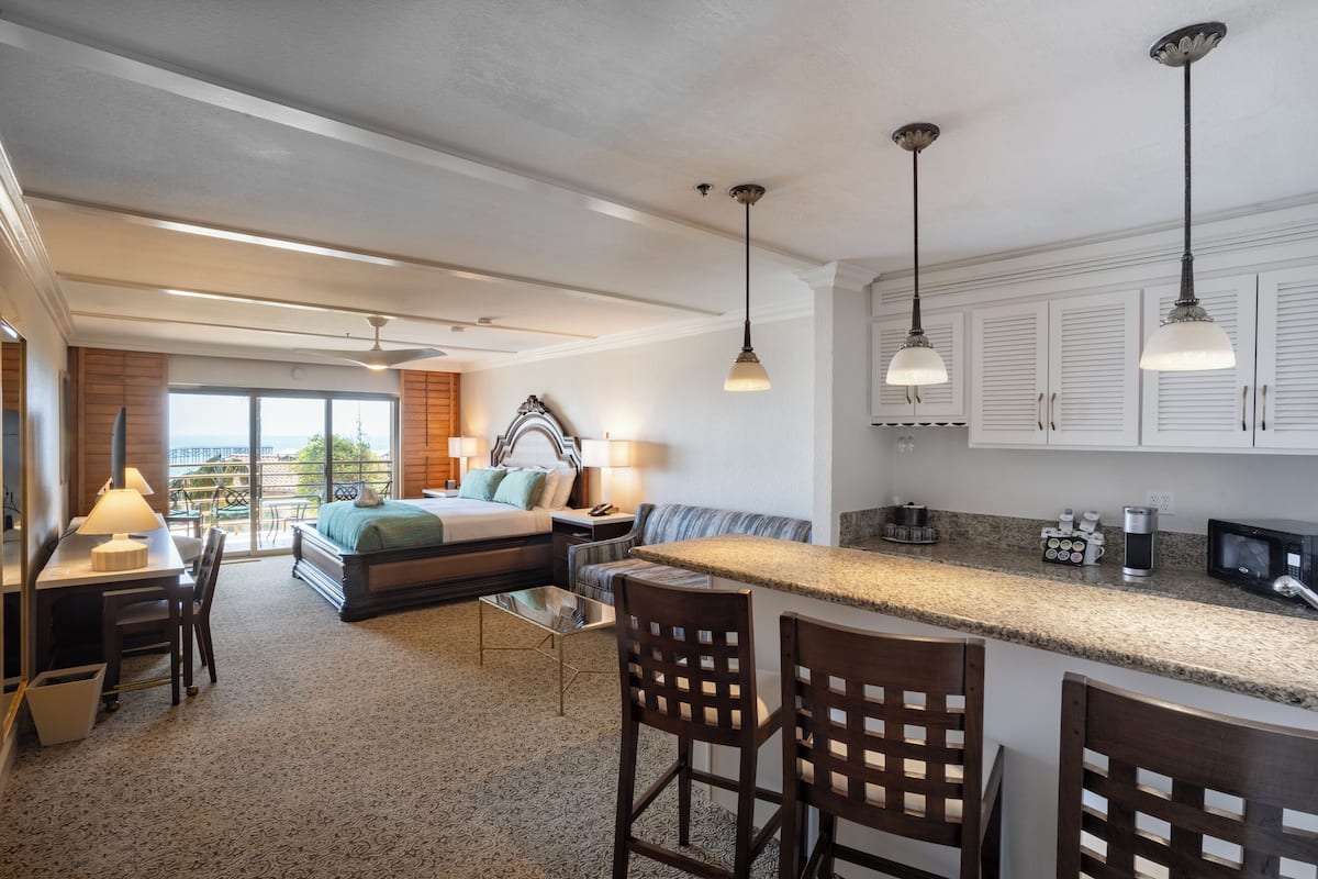 Junior Suite, 1 King Bed, Partial Ocean View | 1 bedroom, hypo-allergenic bedding, in-room safe, desk