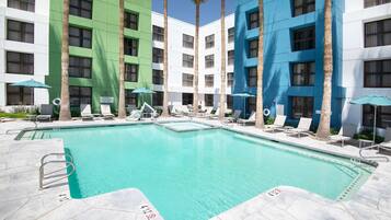 Outdoor pool, open 6:00 AM to 10:00 PM, pool umbrellas, sun loungers