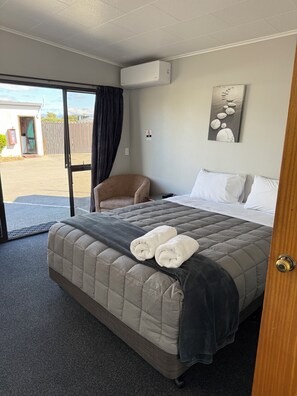 1 bedroom, laptop workspace, blackout drapes, iron/ironing board