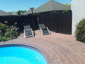 Seasonal outdoor pool, pool umbrellas, pool loungers