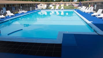Seasonal outdoor pool, open 9:00 AM to 7:00 PM, pool umbrellas
