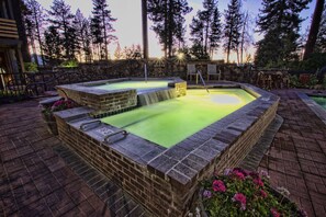 Outdoor pool, open 10:00 AM to 10:00 PM, pool loungers