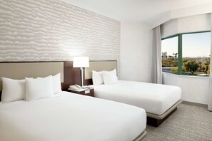 Premium bedding, down comforters, pillowtop beds, in-room safe