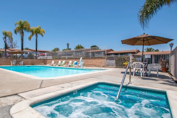 Outdoor pool, open 9:00 AM to 8:00 PM, sun loungers