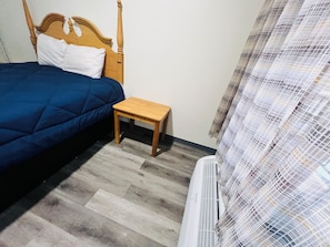 Room, 1 King Bed, Smoking | Desk, iron/ironing board, free WiFi, bed sheets