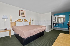 Room, 1 King Bed, Non Smoking, Jetted Tub | Desk, iron/ironing board, free WiFi, bed sheets