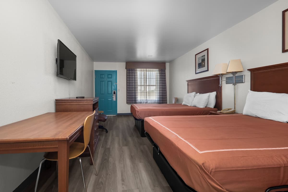 Suite, 2 Queen Beds, Non Smoking | Desk, iron/ironing board, free WiFi, bed sheets