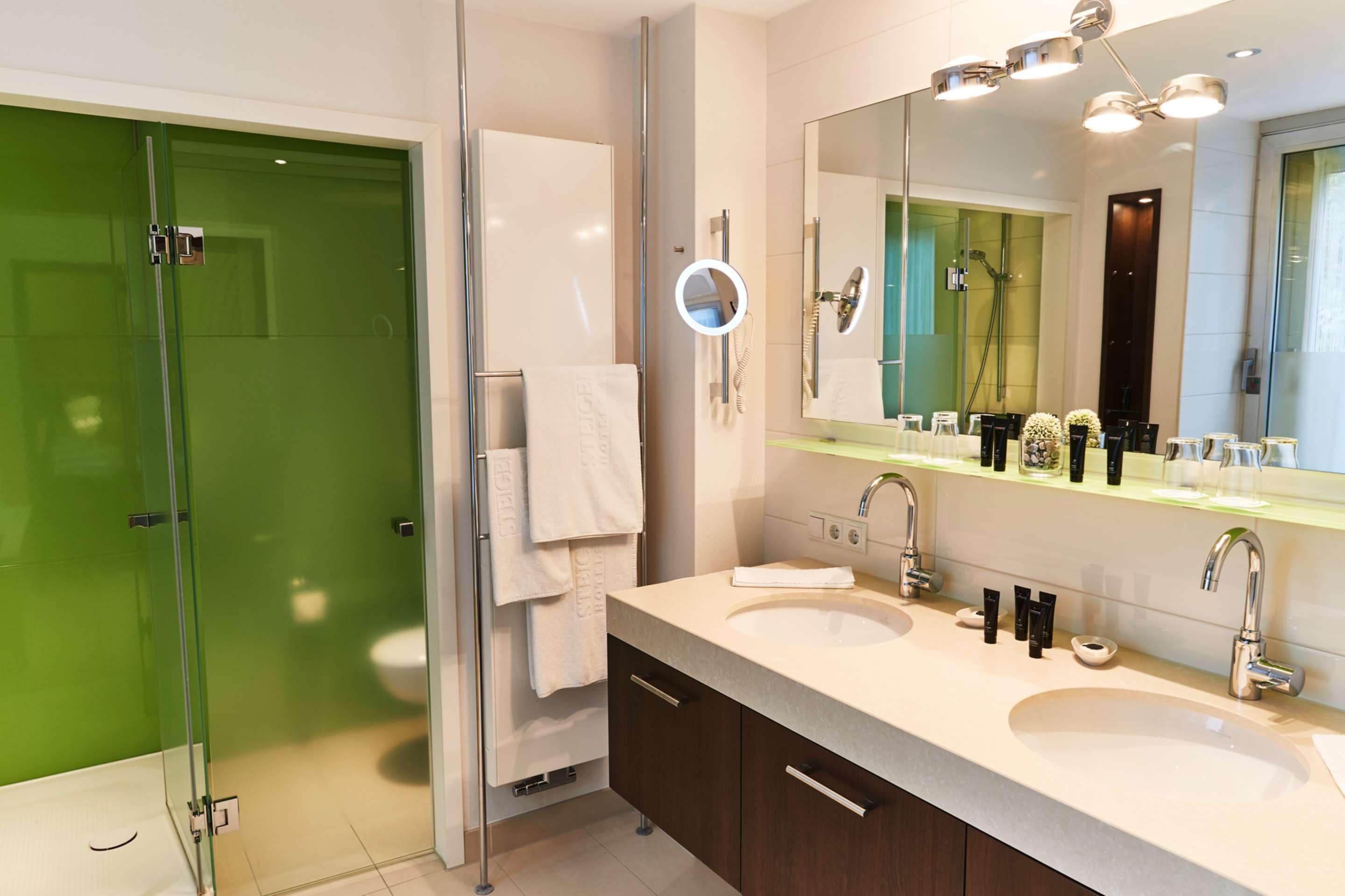 family room | bathroom | shower, eco-friendly toiletries, hair dryer, towels