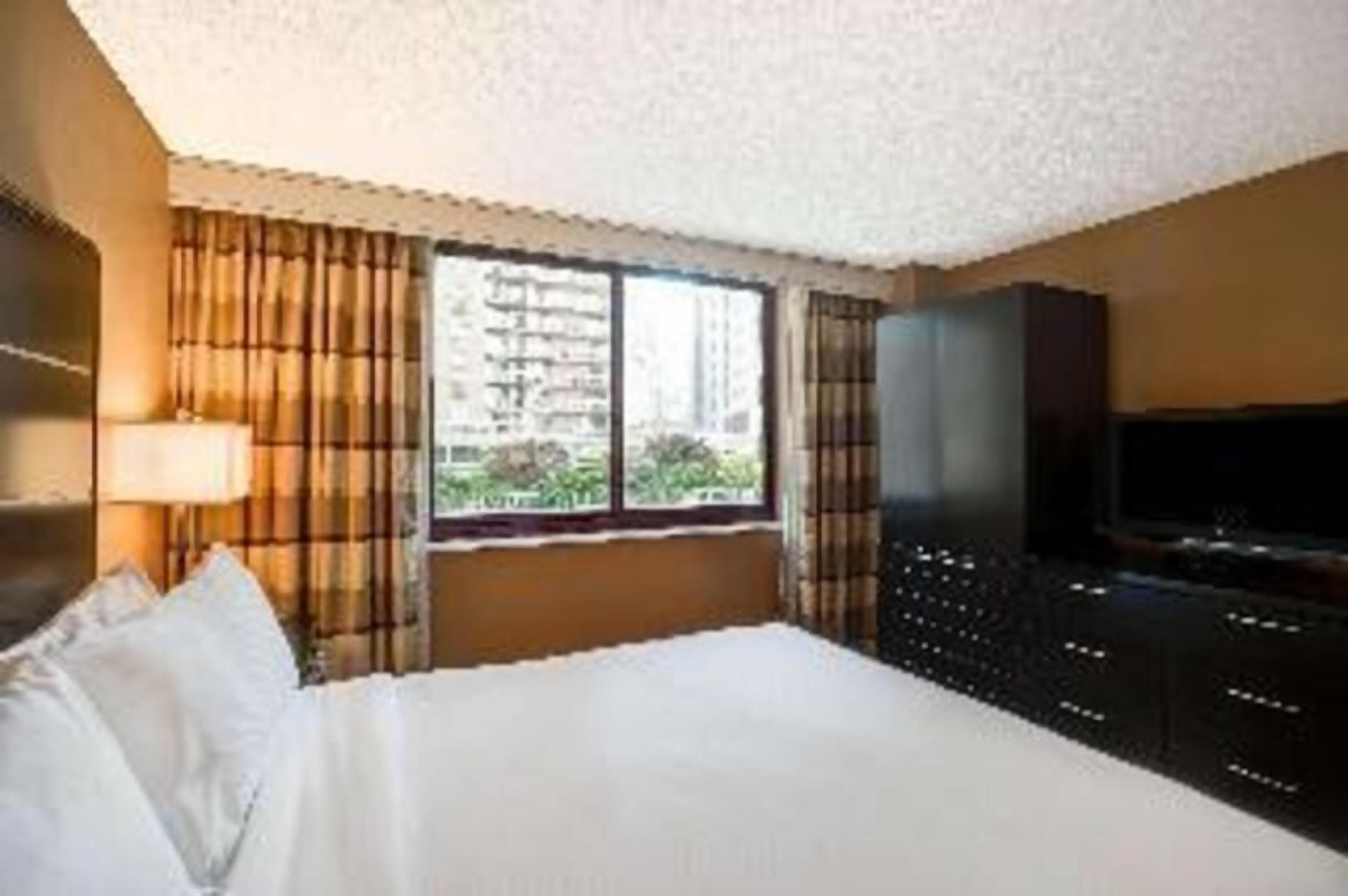 Hypo-allergenic bedding, pillowtop beds, in-room safe, blackout drapes