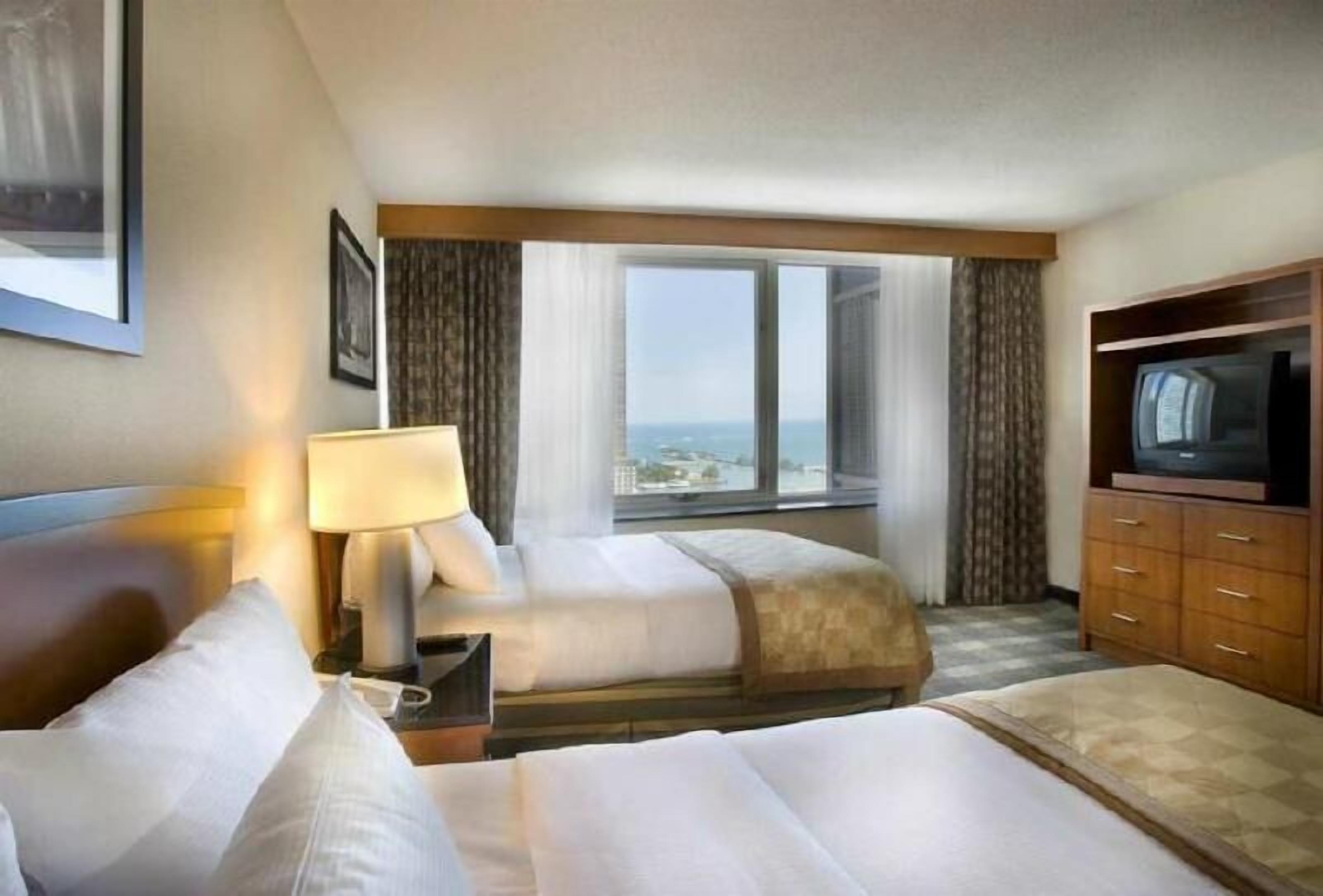 Hypo-allergenic bedding, pillowtop beds, in-room safe, blackout drapes