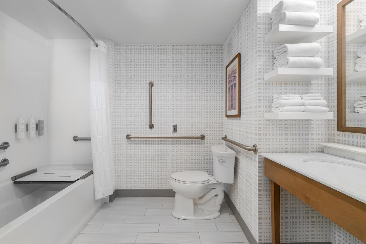 Hydromassage showerhead, hair dryer, towels, soap