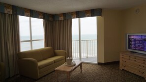 King Ocean Front | Living area | 27-inch TV with cable channels