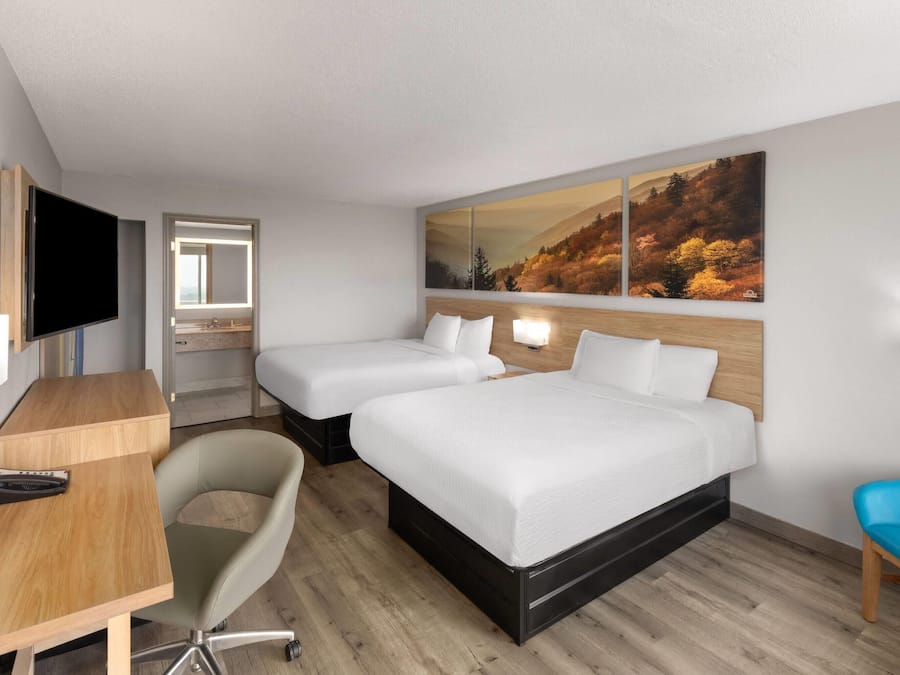 Down duvets, desk, laptop workspace, iron/ironing board