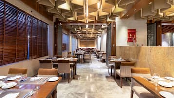 3 restaurants, breakfast, lunch, dinner served; Indian cuisine