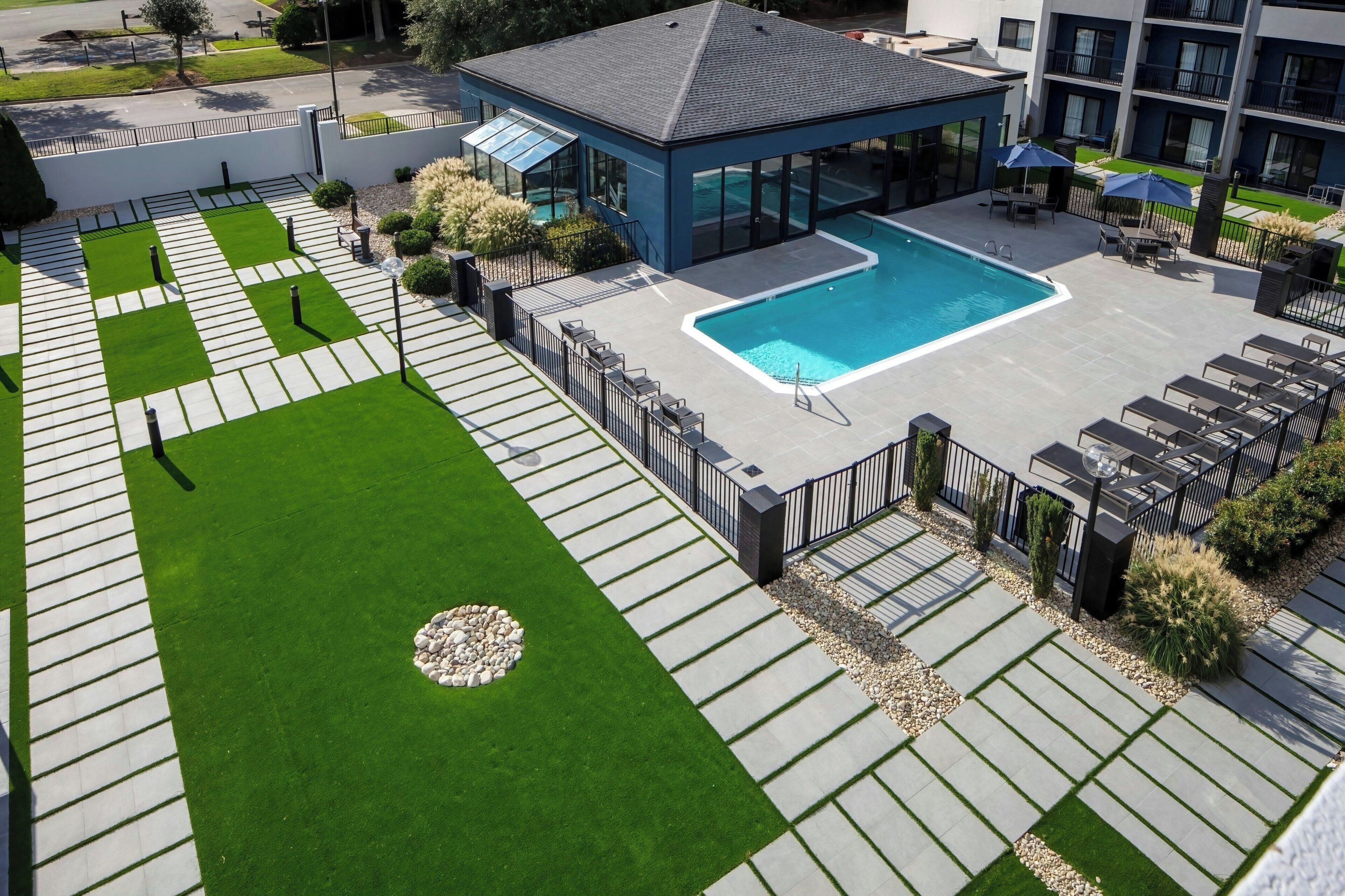 Indoor pool, outdoor pool, open 10:00 AM to 10:00 PM, pool loungers