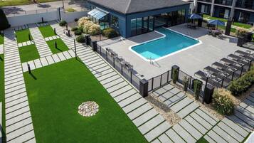 Indoor pool, outdoor pool, open 10:00 AM to 10:00 PM, pool loungers