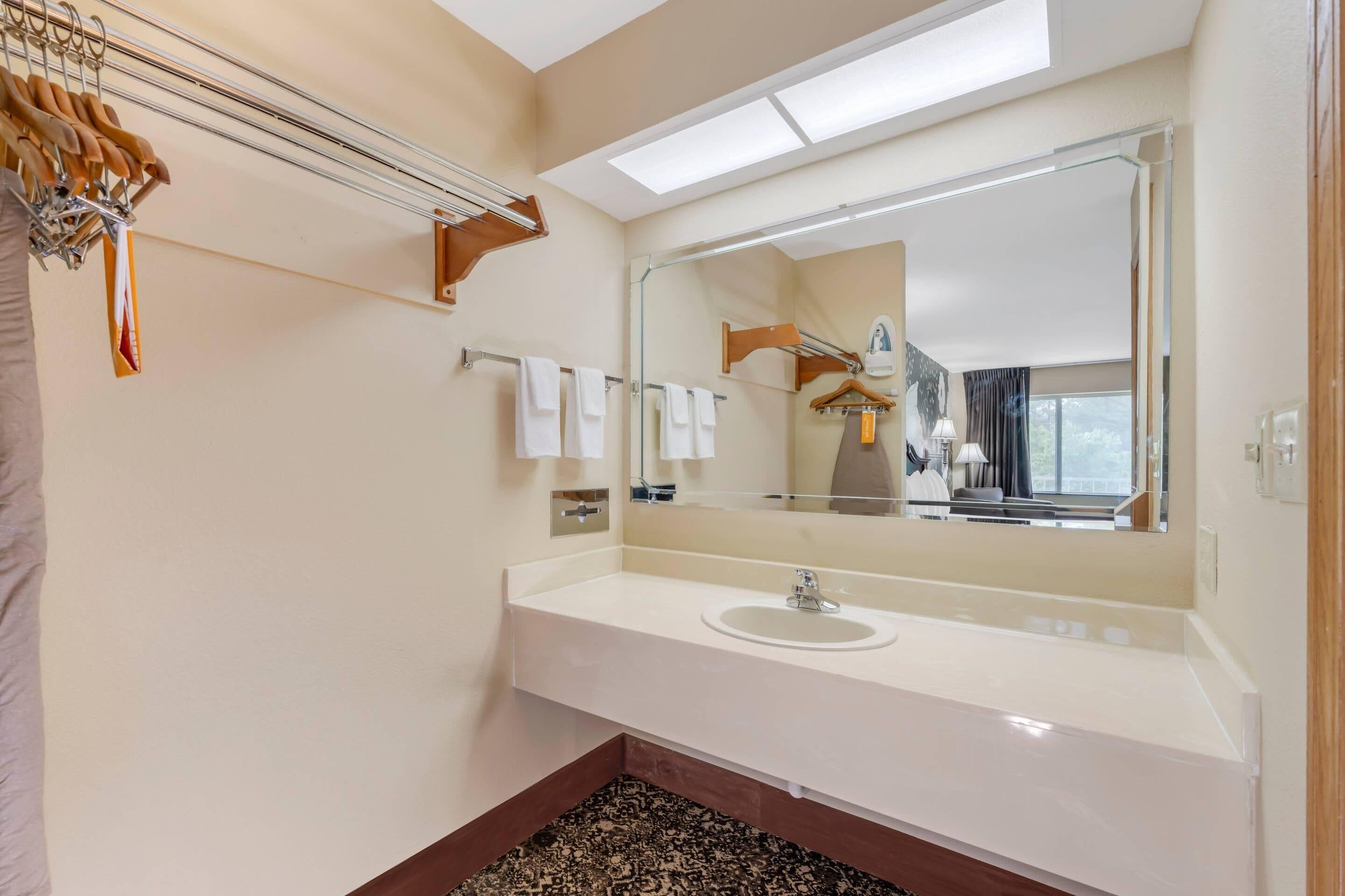 1 bedroom, premium bedding, laptop workspace, iron/ironing board