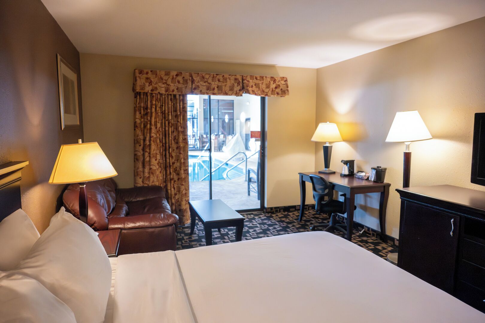 Standard Room, 1 King Bed, Poolside | Desk, iron/ironing board, free cribs/infant beds, rollaway beds