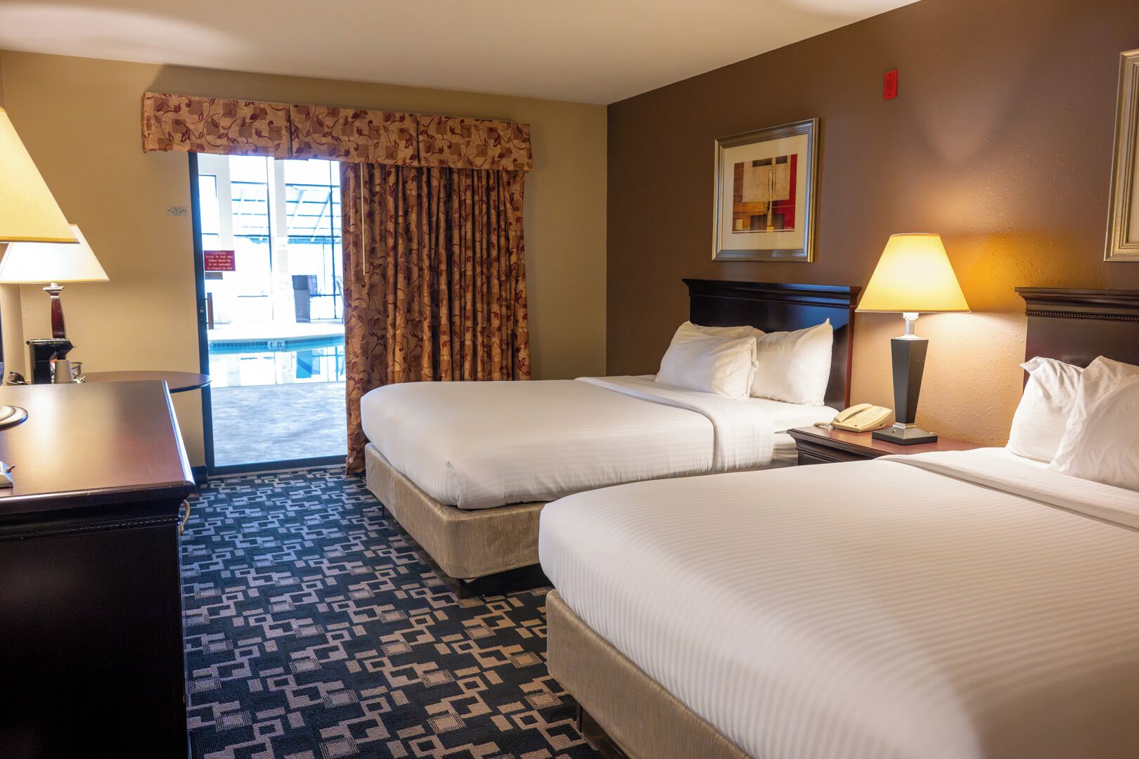 Standard Room, 2 Queen Beds, Non Smoking, Poolside | Desk, iron/ironing board, free cribs/infant beds, rollaway beds