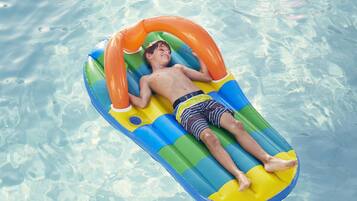 Relax by the pool with a refreshing swim or lounge on one of the pool floats.