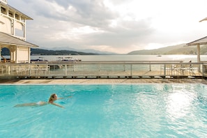 Indoor pool, outdoor pool, pool umbrellas, pool loungers