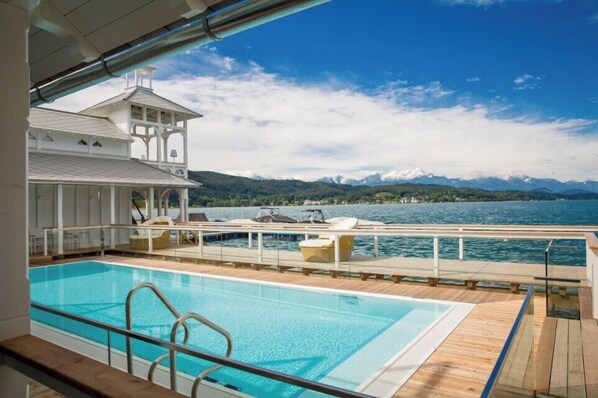 Indoor pool, outdoor pool, open 7:00 AM to 9:00 PM, pool umbrellas