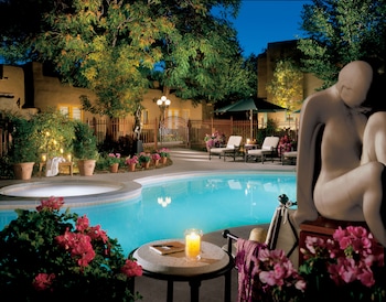 Outdoor pool, pool umbrellas at La Posada de Santa Fe, A Tribute Portfolio Resort & Spa