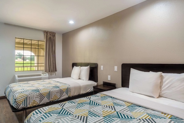Blackout drapes, WiFi (free), bed sheets