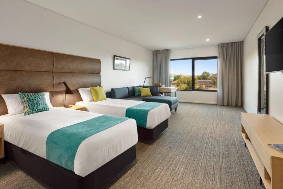 Rom – executive, 2 enkeltsenger | Minibar, skrivebord, strykejern/-brett og barnesenger