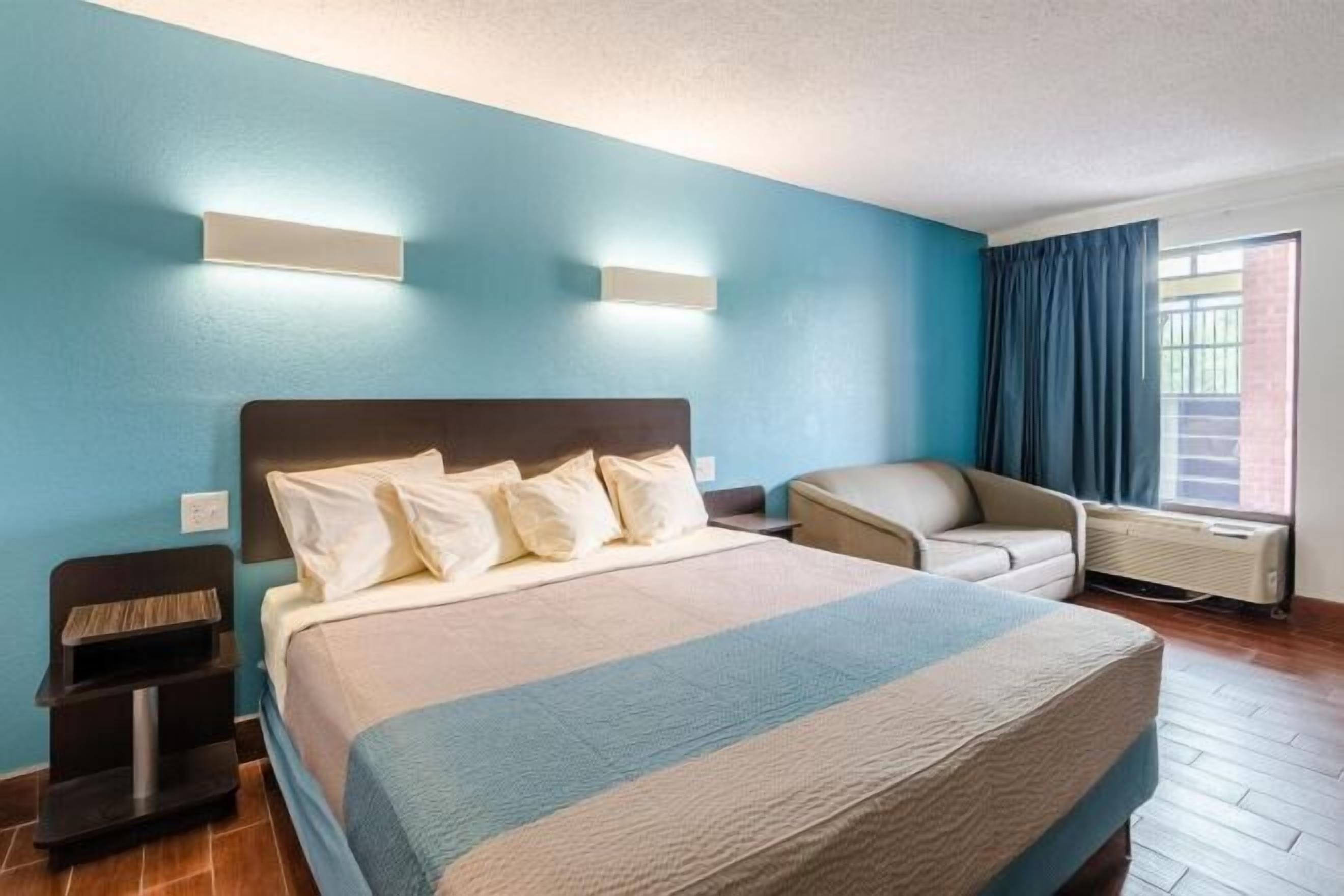 Memory-foam beds, desk, blackout curtains, iron/ironing board