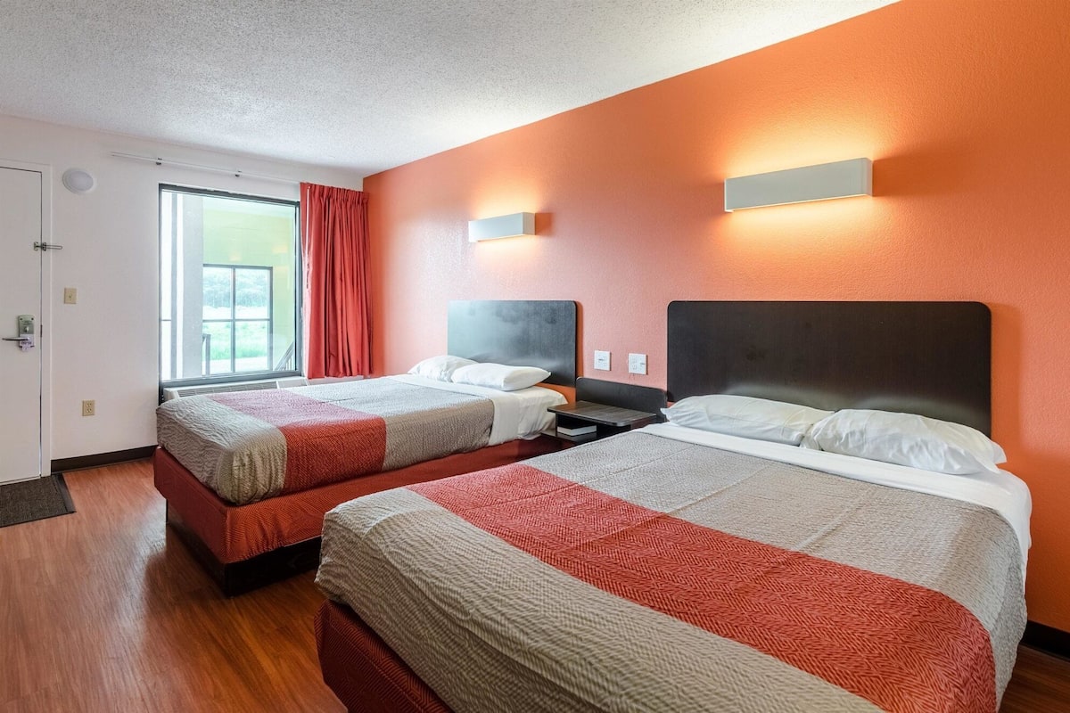 Memory-foam beds, desk, blackout curtains, iron/ironing board