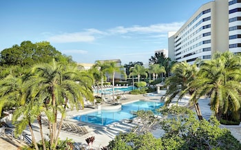 2 outdoor pools, sun loungers at Hilton Orlando Lake Buena Vista - Disney Springs® Area