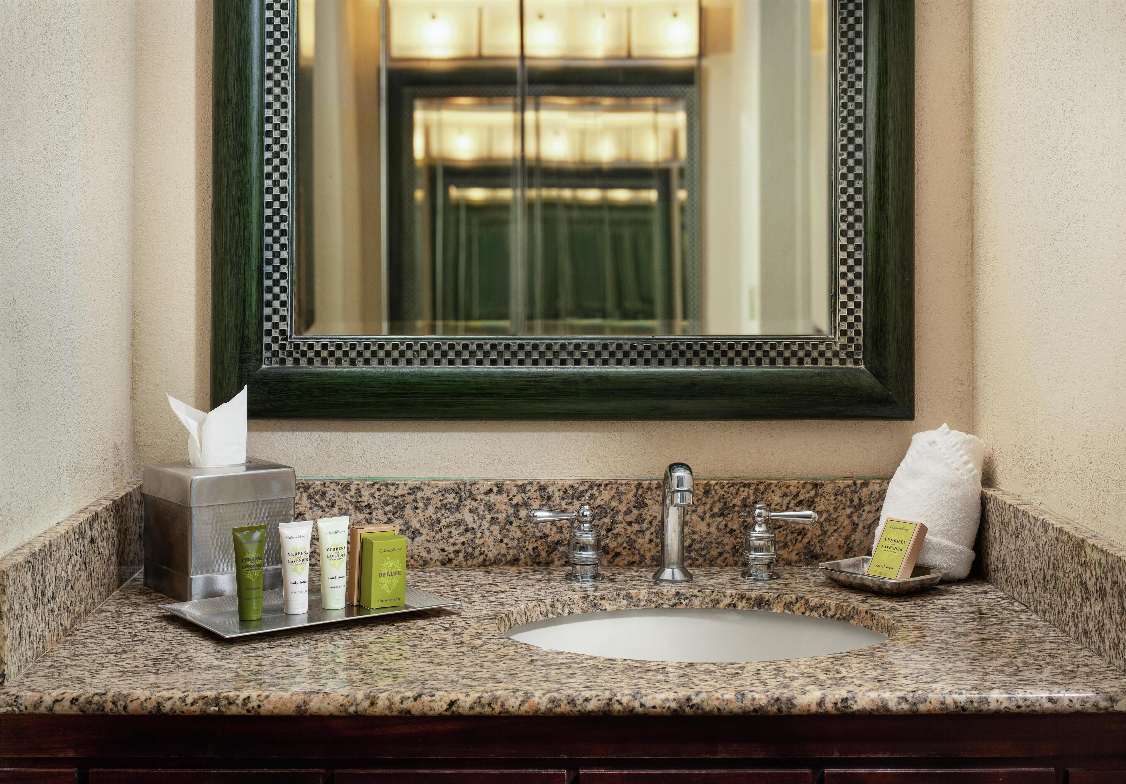 Combined shower/tub, designer toiletries, hair dryer, bathrobes