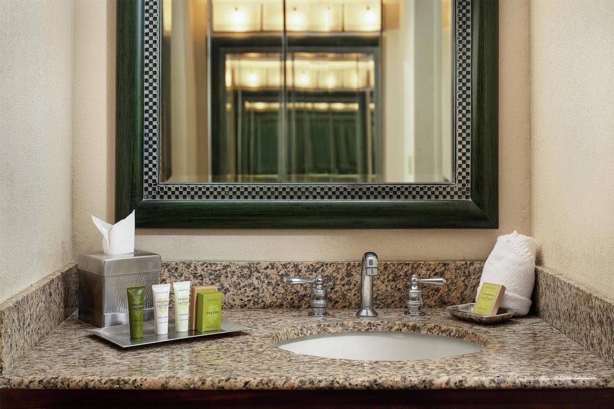 Combined shower/tub, designer toiletries, hair dryer, bathrobes